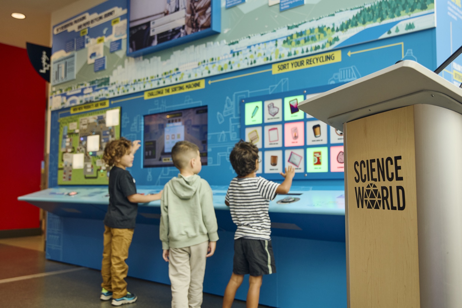 Children exploring the RecycleBC exhibit at Science World