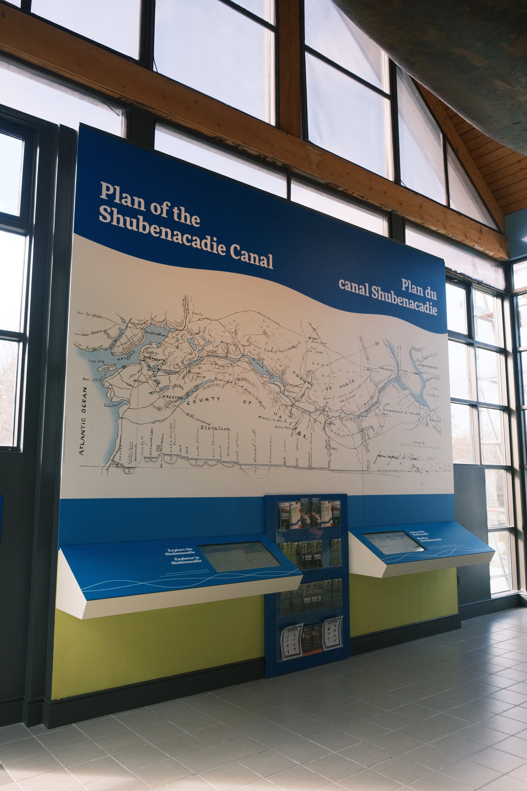 The Plan of the Shubenacadie Canal wall, with two angled touchscreens set into its base